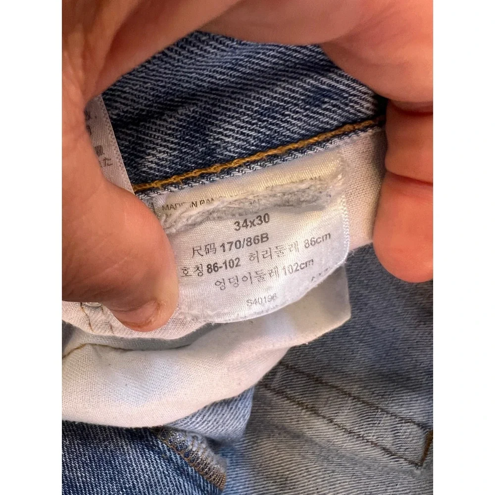 Levis 550 Relaxed Fit Light Wash Denim Jeans Mens 34x30 Blue Tapered Leg